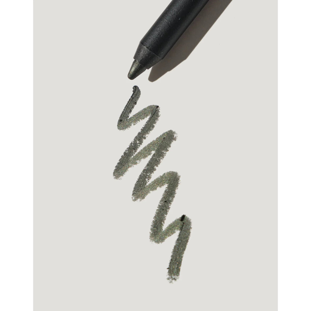 Black marker pen drawing zigzag lines on a white background