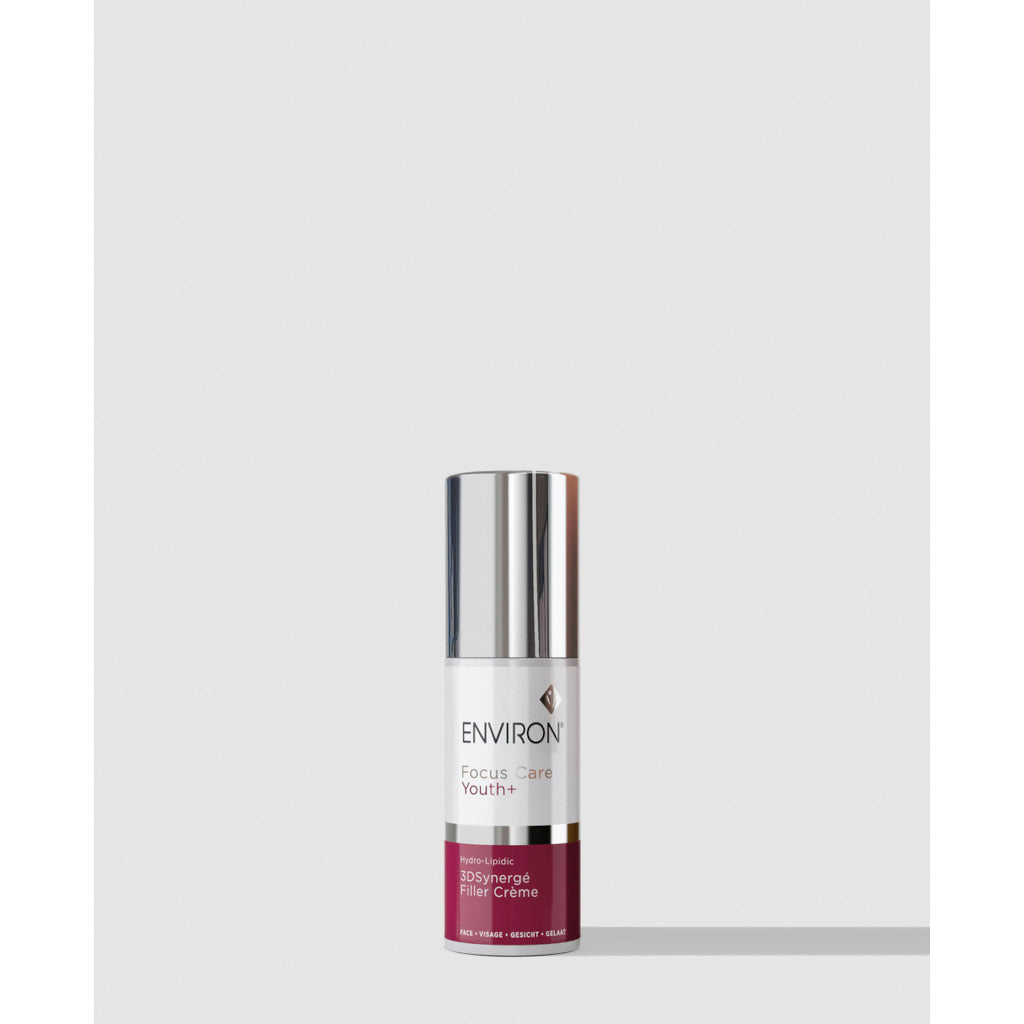 Skincare bottle labeled 'Environ' on a light gray background