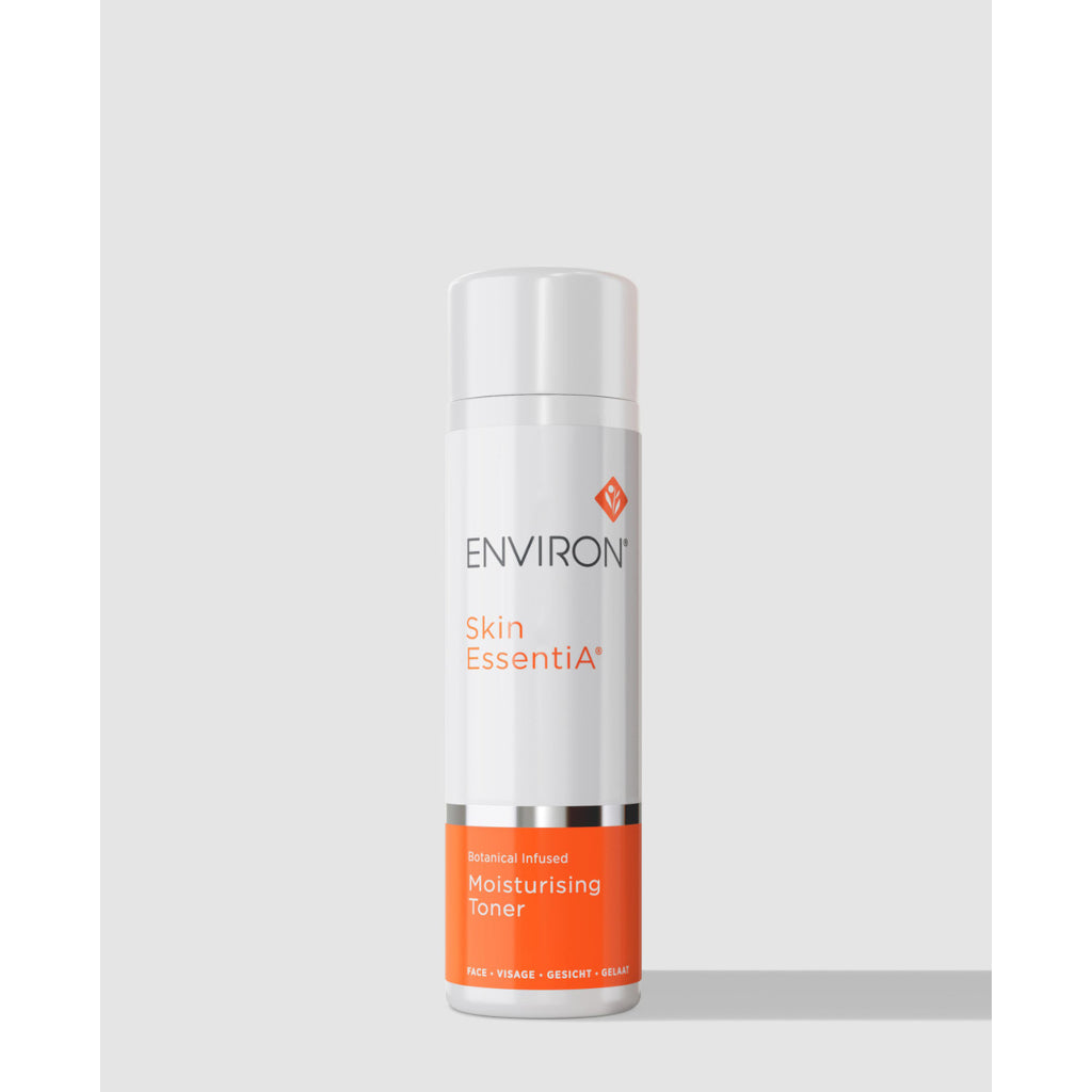Skincare bottle labeled 'Environ Skin Essentia' on a light gray background
