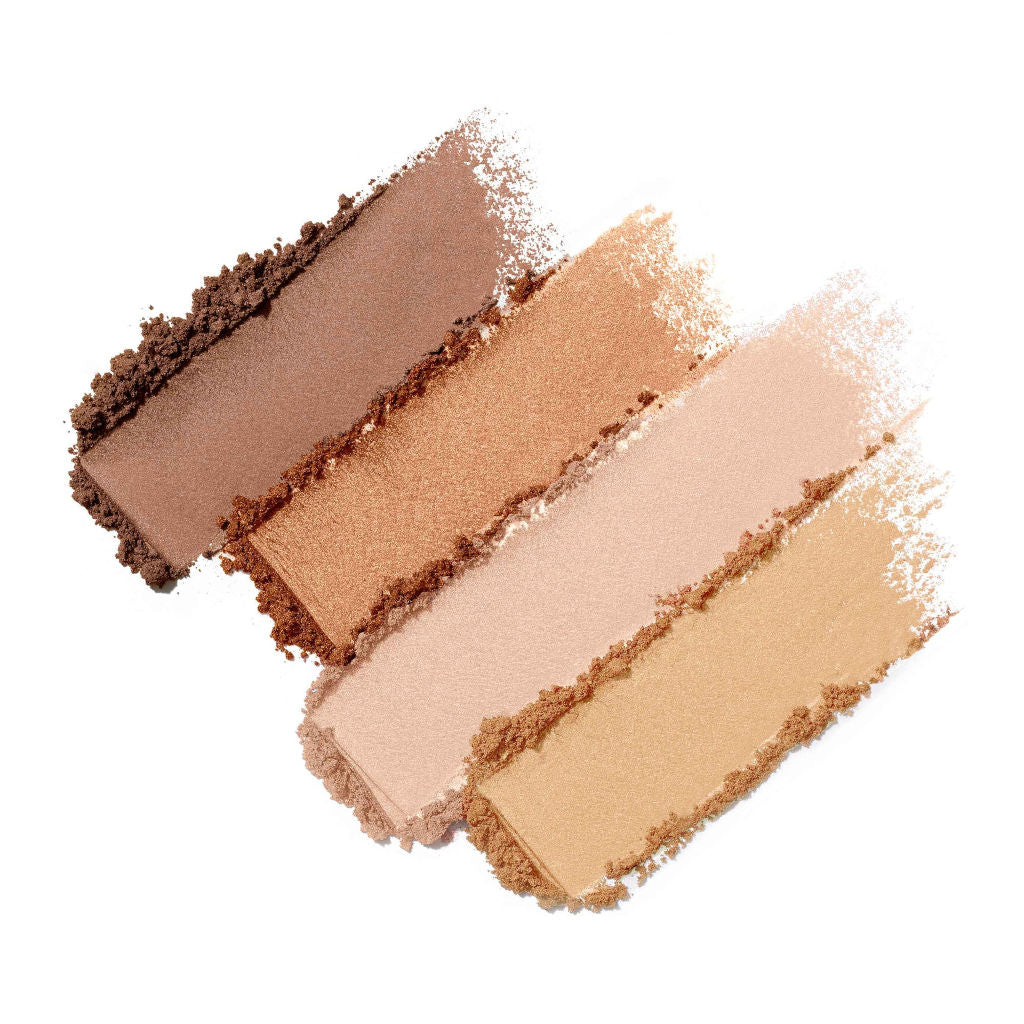Set of four makeup swatches in brown and beige tones on a white background