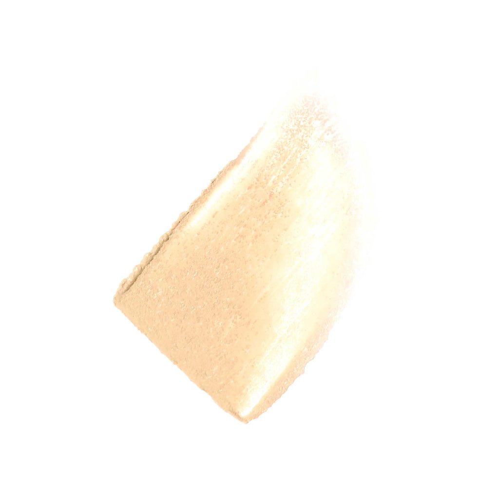 Gold earring on a white background