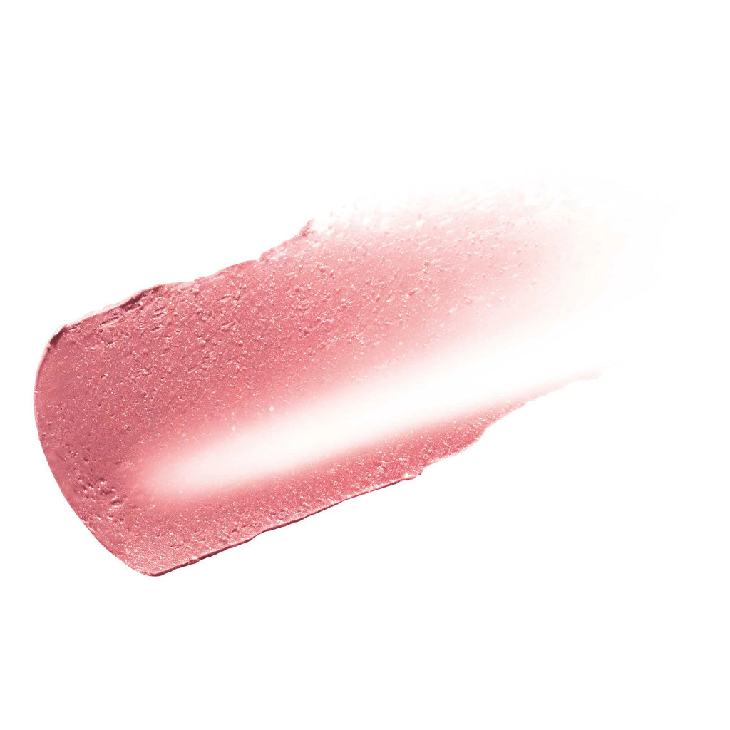Pink lip gloss swatch on a white background