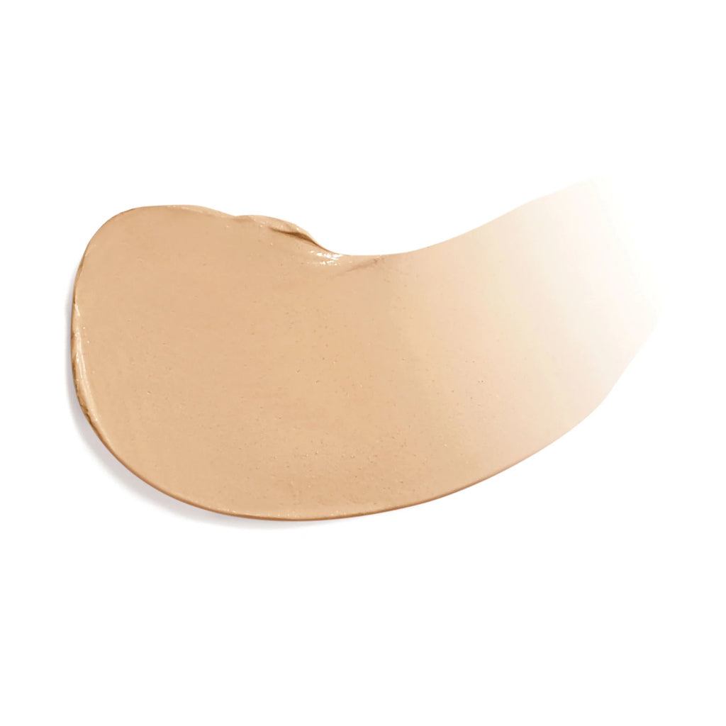 Beige makeup swatch on a white background