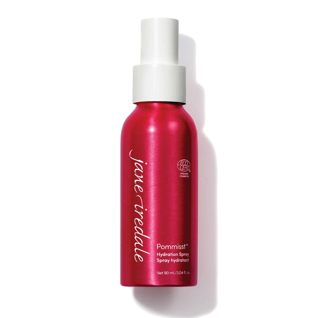 Red spray bottle with white cap on a white background