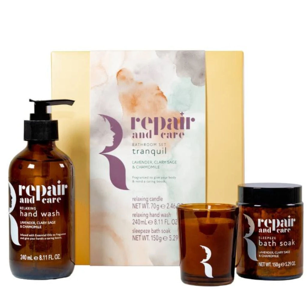 Set of 'Repair and Care' products including hand wash, candle, and bath soak with a box in the background.