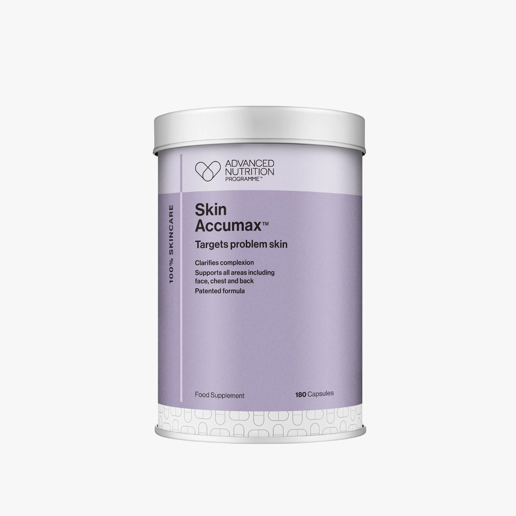 Supplement container labeled 'Skin Accumax' by Advanced Nutrition on a white background